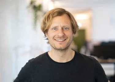 Andreas Bermig lächelt